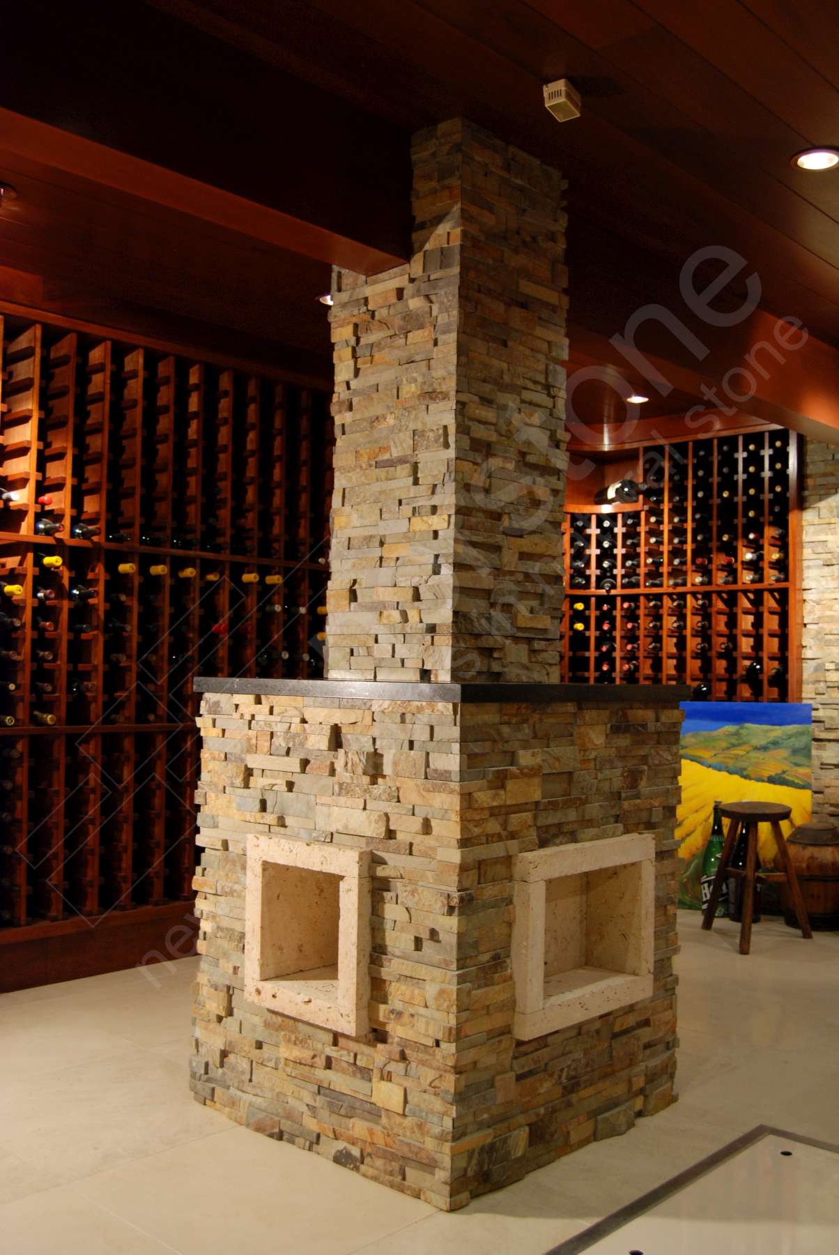Norstone Ochre Stacked Stone Rock Panels on a column with miter cut corners on an underground Wine Cellar in California